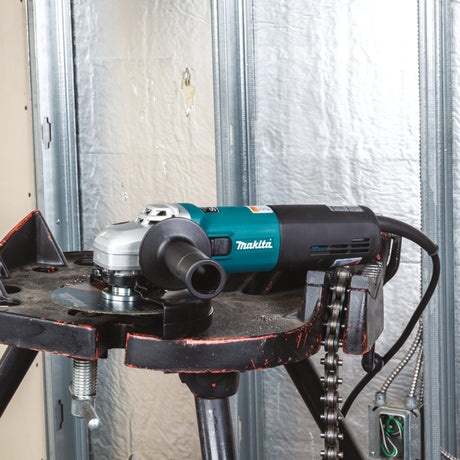 Makita SJS High-Power Angle Grinder 4.5 to 6 Inch for Stone Cutting - in use